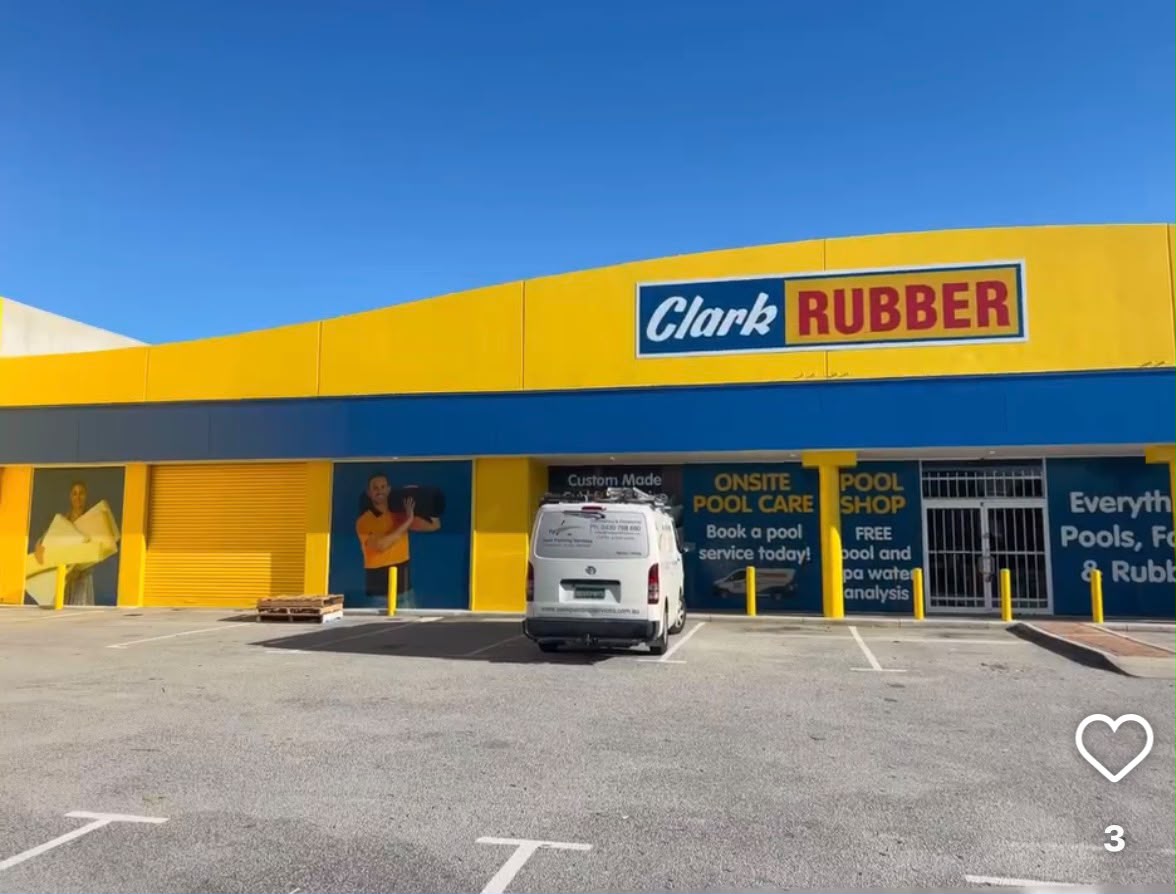 Clark Rubber commercial retail building repaint with Seek Property Services Pty Ltd van