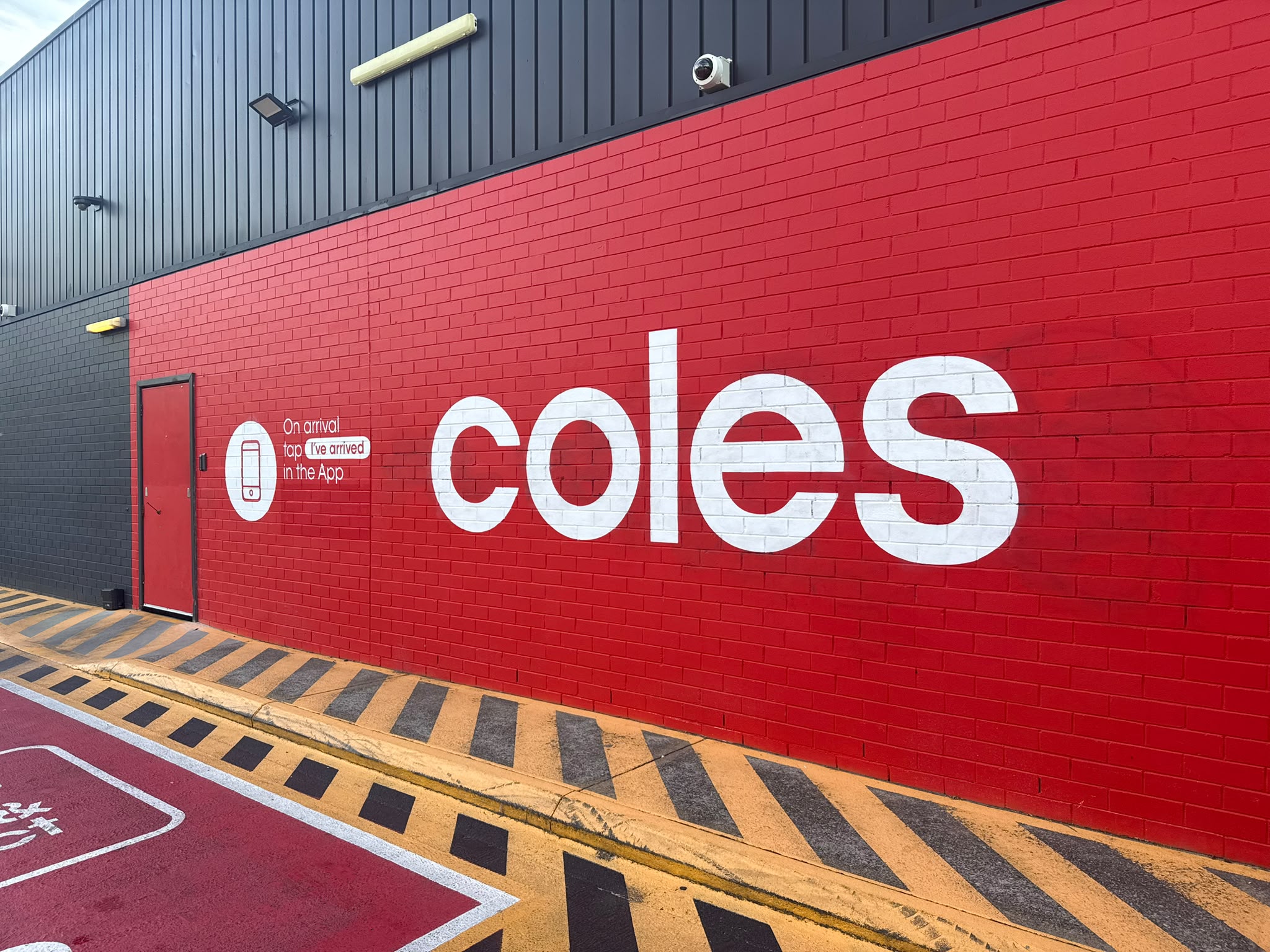 Coles Supermarket exterior brick wall painting in Perth