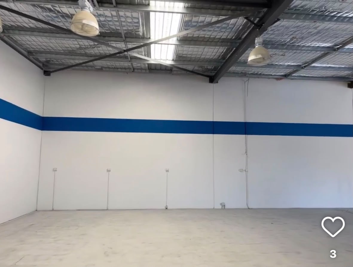 Industrial Facility White Wall with Royal Blue Accent Stripe in Wangara