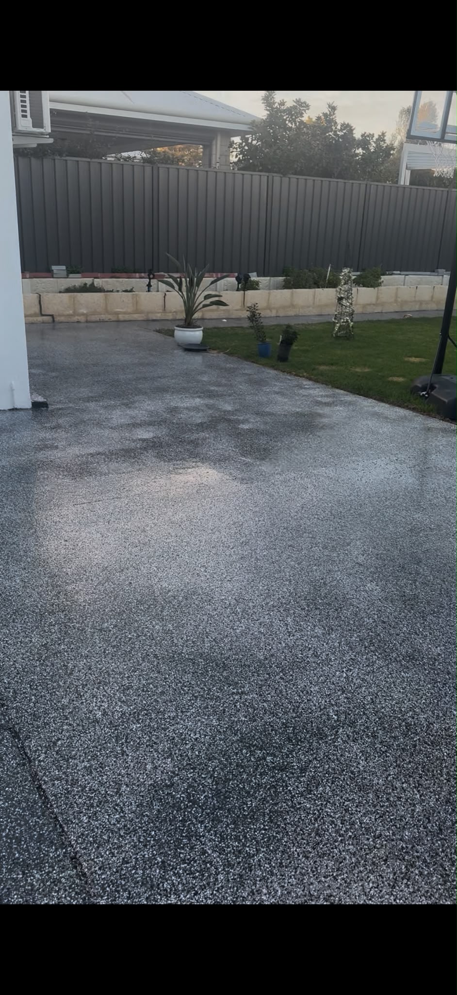 High-gloss outdoor concrete flake resurfacing and driveway sealing